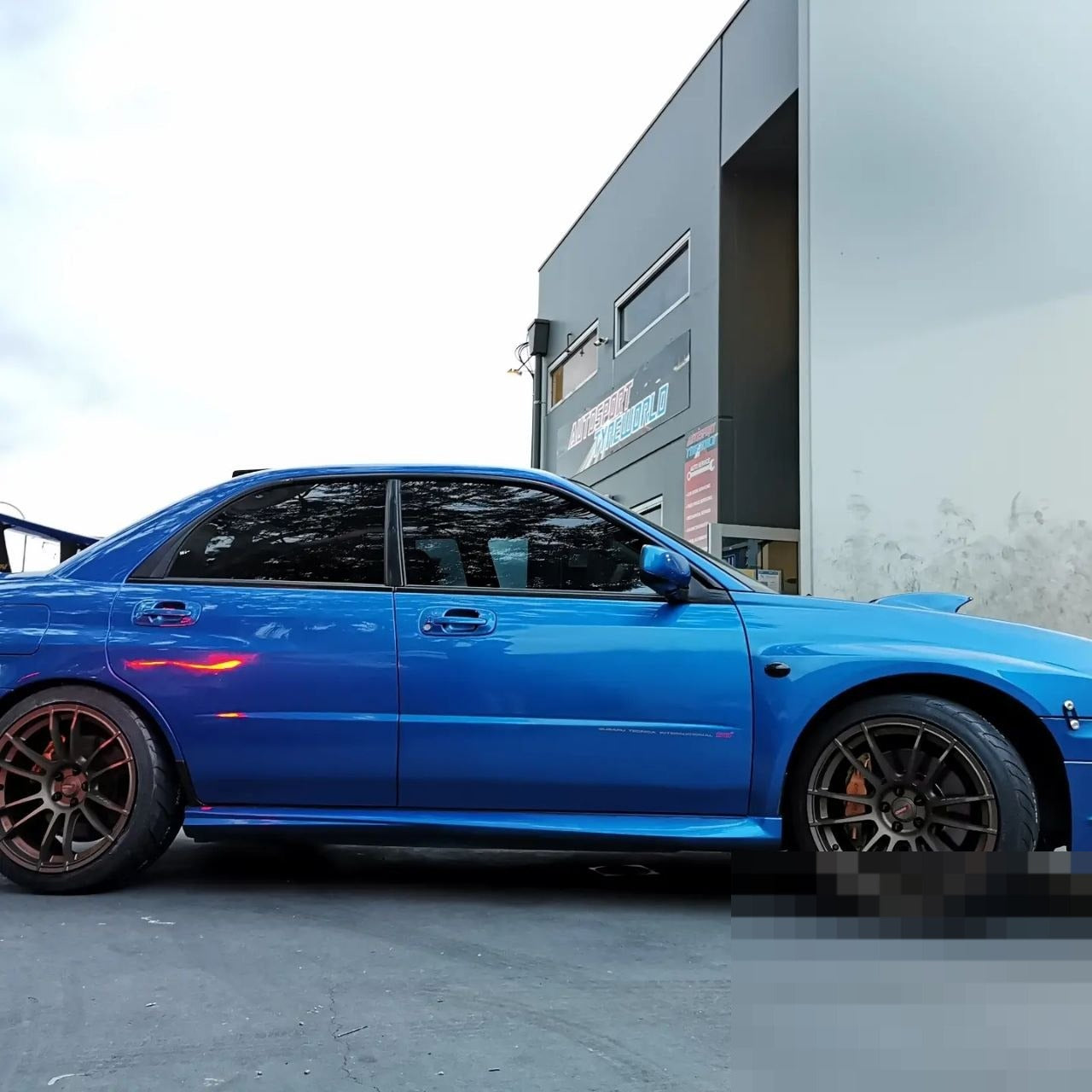 Subaru STI Four-Wheel Alignment After Gram Lights and Hankook RS4
