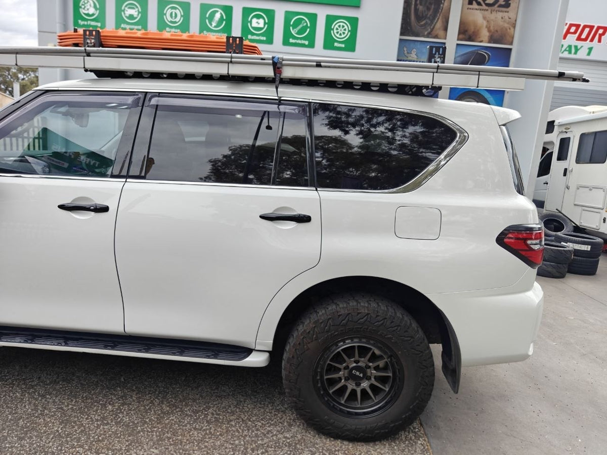 Nissan Patrol Y62 Four-Wheel Alignment After CSA and Falken RT01 Fitment