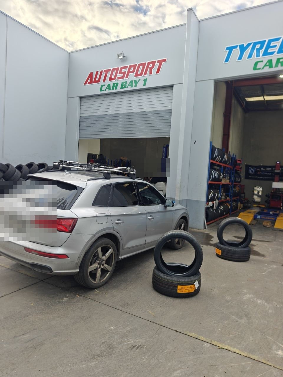 Audi SQ5 fitted with 265/40R21 Continental UltraContact UX7 tyres at Autosport Tyre World Magill