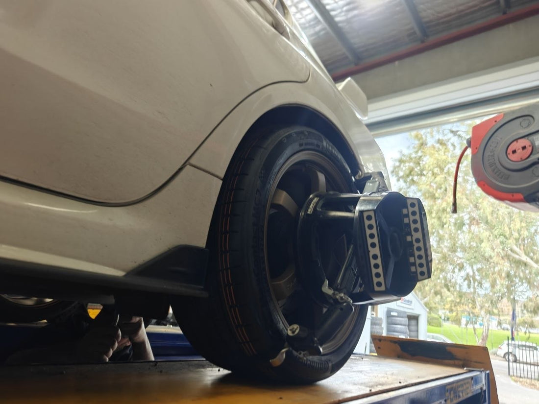 Rays 57DR Dark Bronze on White Subaru STI Workshop Case Adelaide