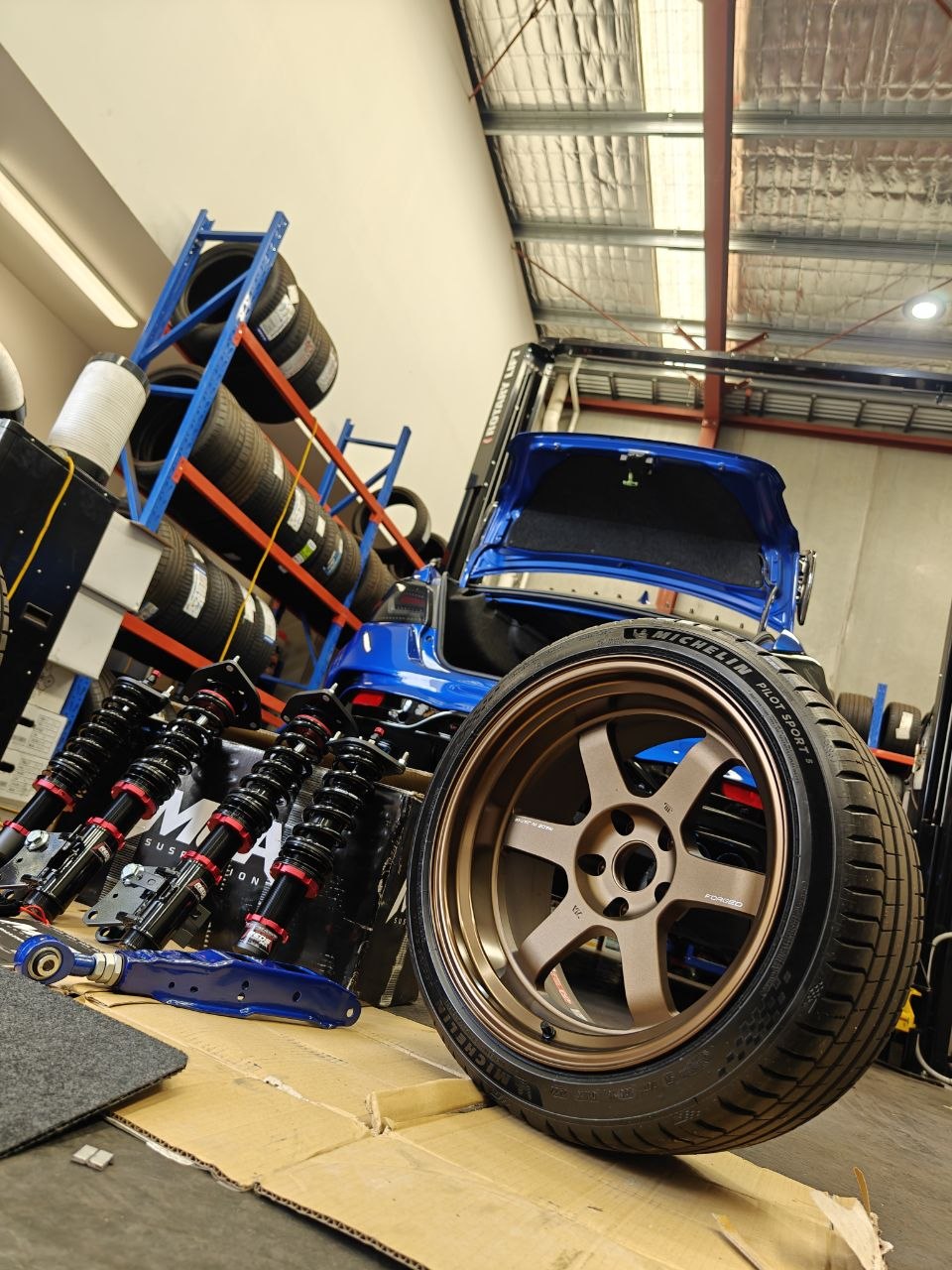 Subaru WRX Four-Wheel Alignment After MCA Red TE37V PS5