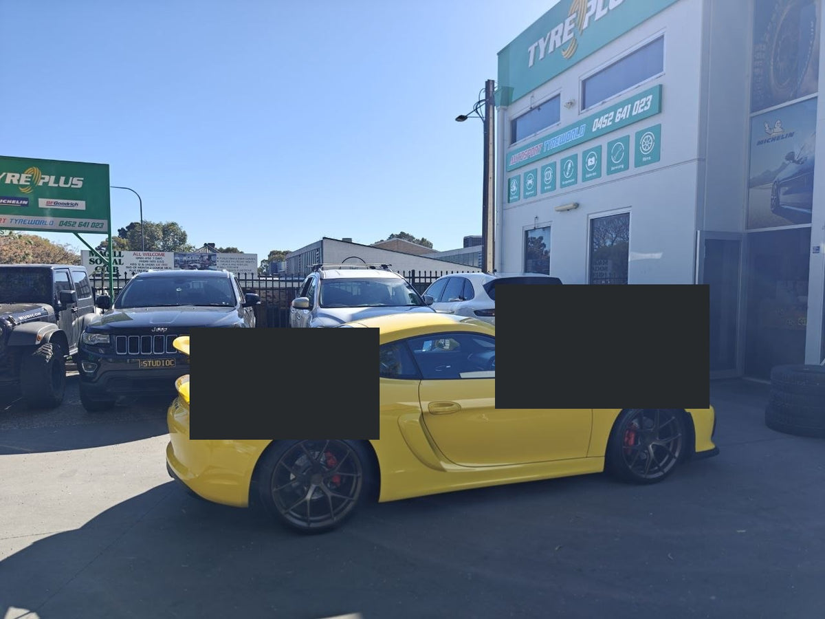 Porsche Cayman GT4 981 fitted with Continental SportContact 7 tyres at Autosport Tyre World Magill